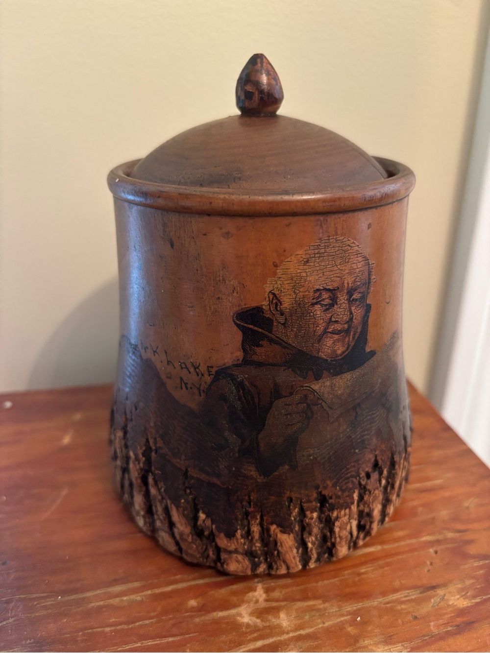 Handcrafted Brown Wood Canister with Monk Illustration